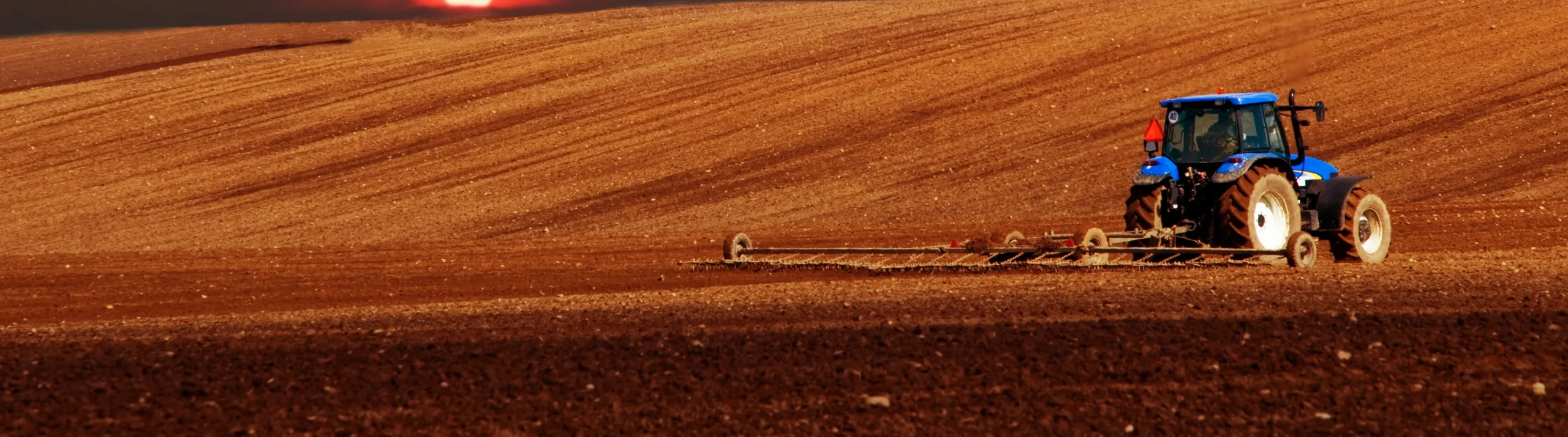 tractor plowing scaled